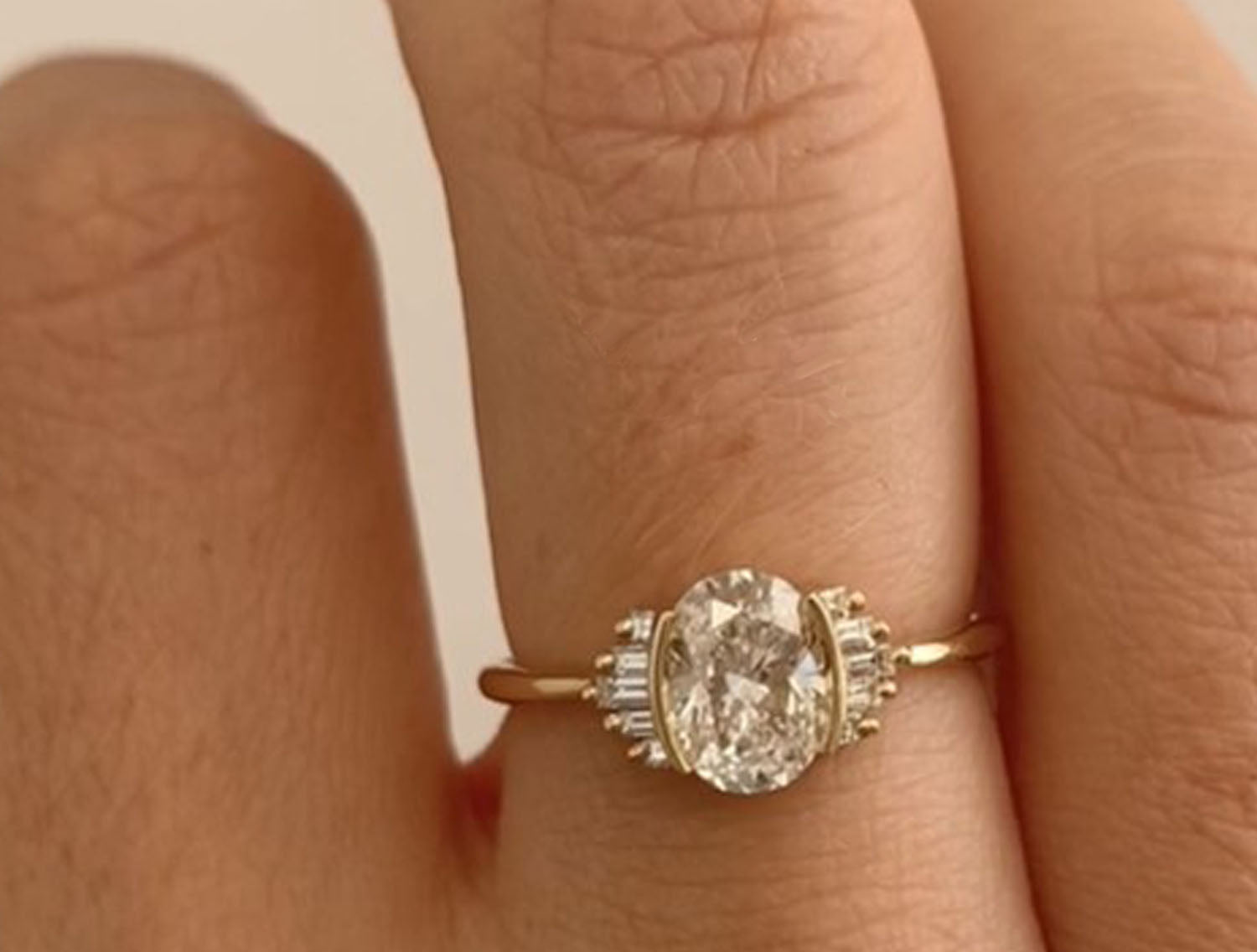 Oval Diamond and Baguette Engagement Ring
