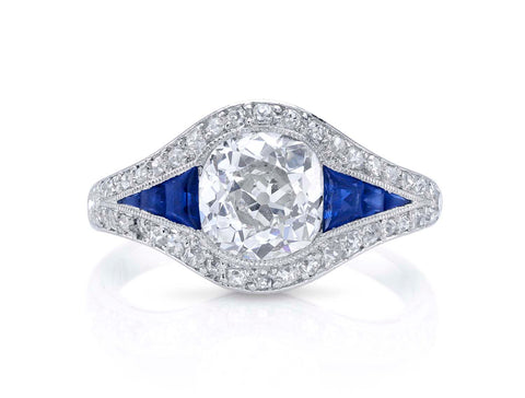 Paraiba Tourmaline and Diamond Halo Ring in Platinum