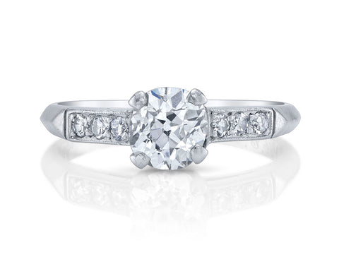 Paraiba Tourmaline and Diamond Halo Ring in Platinum
