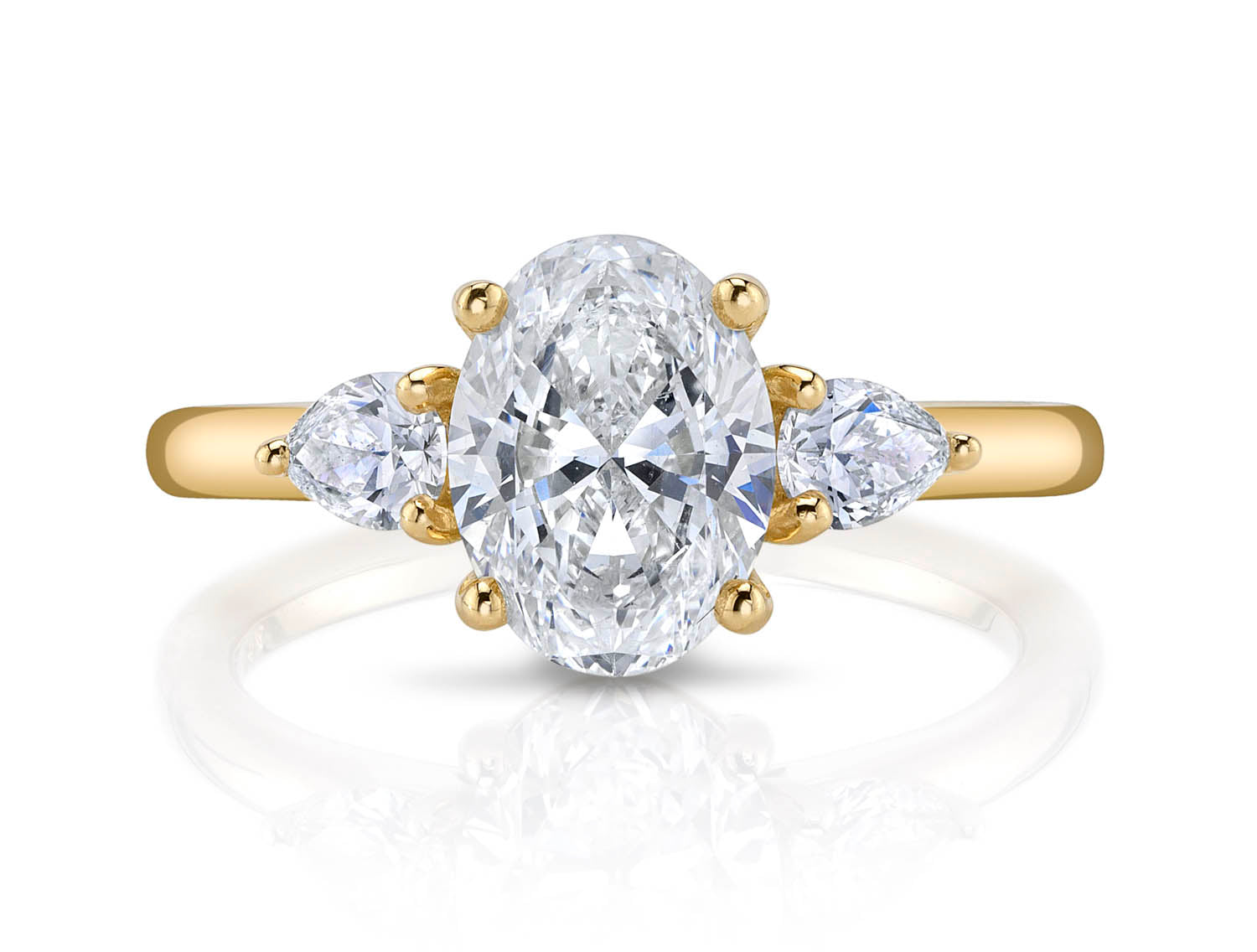 Oval and Pear Diamond Three-Stone Engagement Ring