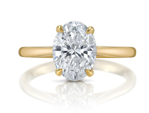 Paraiba Tourmaline and Diamond Halo Ring in Platinum
