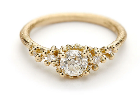 Paraiba Tourmaline and Diamond Halo Ring in Platinum