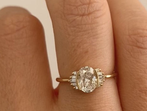 Oval Diamond and Baguette Engagement Ring
