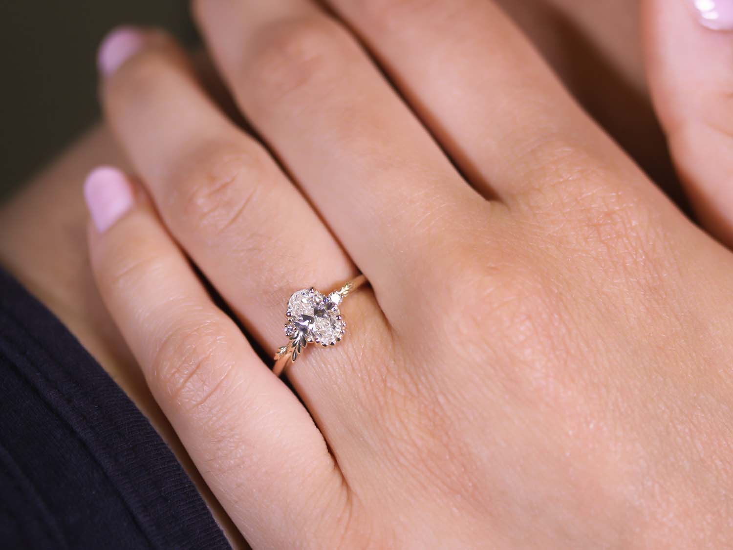 Oval and Round Diamond Three-Stone Engagement Ring